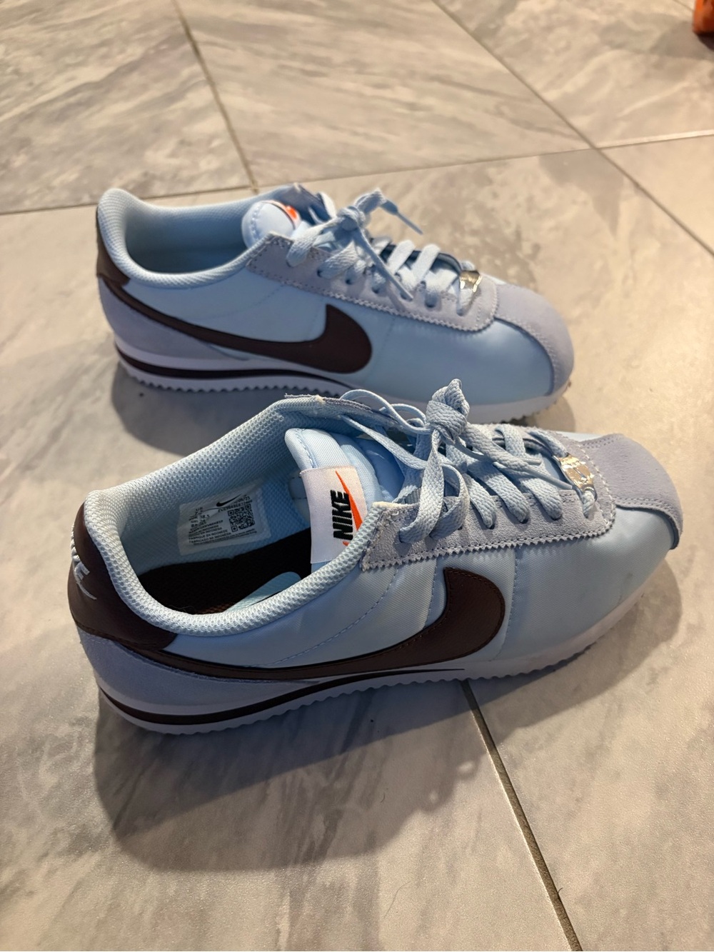 Nike Cortez light blue with Brown/maroon Swoosh